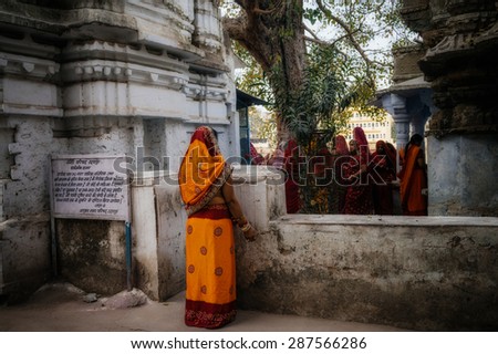 JAIPUR-MARCH 04 :woman preparing for religious celebration in the street on March 04, 2014 in Jaipur,india