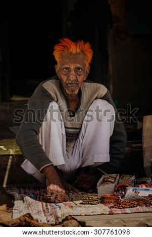JAIPUR-MARCH 04 :man preparing for religious celebration in the street on March 04, 2014 in Jaipur,india