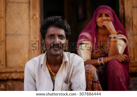 JAISALMER, INDIA - MARCH 22 : Indian couple posing in the street on March 22, 2014 in Jaisalmer, India