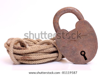 stock photo : Color photo of coils of rope and a lock. Save to a lightbox ▼