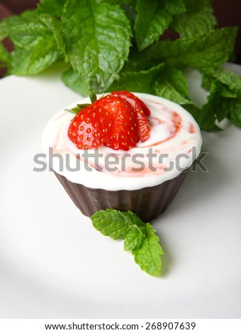 Strawberry cupcake with mint herb