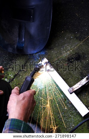 welding torch and sparks