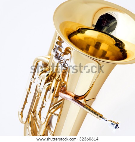 A gold brass tuba euphonium isolated against a white background in the square format.