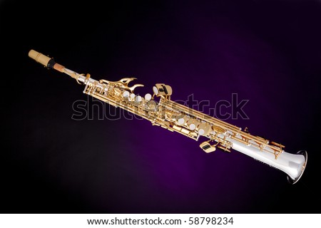 a professional soprano saxophone isolated against a spotlight purple background.