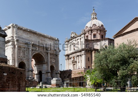 Arch of Septimius Severus . The Roman Forum is located between the Palatine Hill and the Capitoline Hill of the city of Rome, Italy.