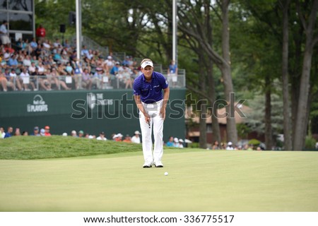 EDISON,NJ-AUGUST 30:Luke Donald lines up his putt on the 18th hole during the final round of the Barclays Tournament held at the Plainfield Country Club in Edison,NJ,August 30,2015.