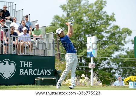 EDISON,NJ-AUGUST 30:Kevin Na watches his shot from the 1st Tee during the final round of the Barclays Tournament held at the Plainfield Country Club in Edison,NJ,August 30,2015.