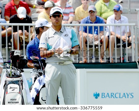 EDISON,NJ-AUGUST 30:Hideki Matsuyama takes a look down the 1st Tee Fairway during the final round of the Barclays tournament held at the Plainfield Country Club in Edison,NJ,August 30,2015.