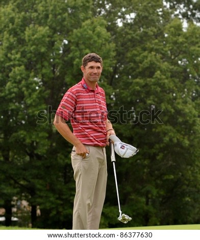EDISON,NJ-AUGUST 27:Golfer Padraig Harrington smiles at  the crowd after completing the final round of the Barclays Tournament held at the Plainfield Country Club on August 27,2011 in Edison,NJ.