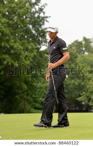 EDISON,NJ-AUGUST 27: Golfer Dustin Johnson studies his putt shot on the 18th during the final round of the Barclays held at the Plainfield Country Club on August 27,2011 in Edison,N.J.