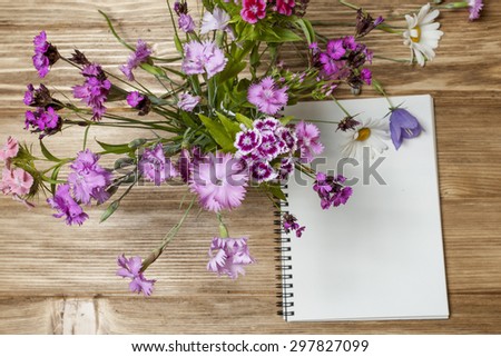 wildflowers end notebook on woodwen table