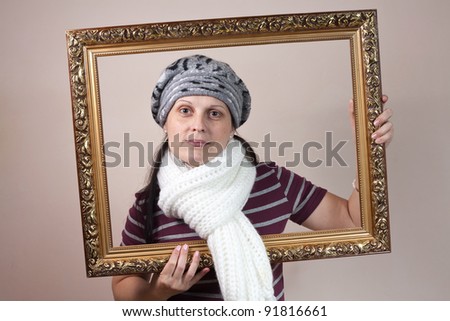 beautiful woman framed in a antique frame