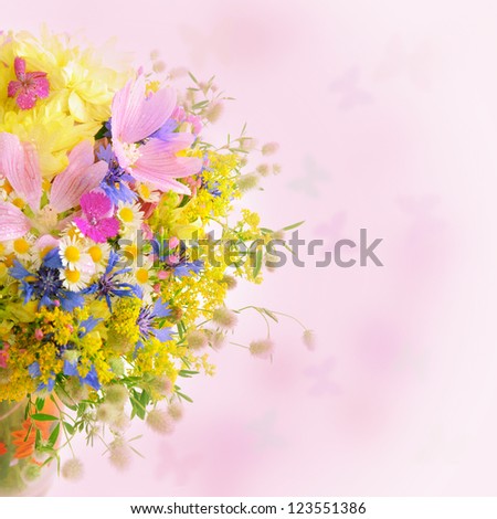 Bouquet of summer flowers with bokeh and copy space