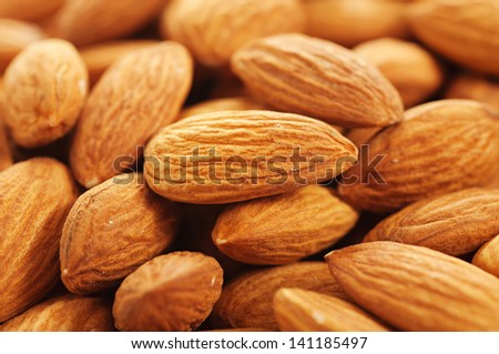 Background from fresh dry peeled almond nuts