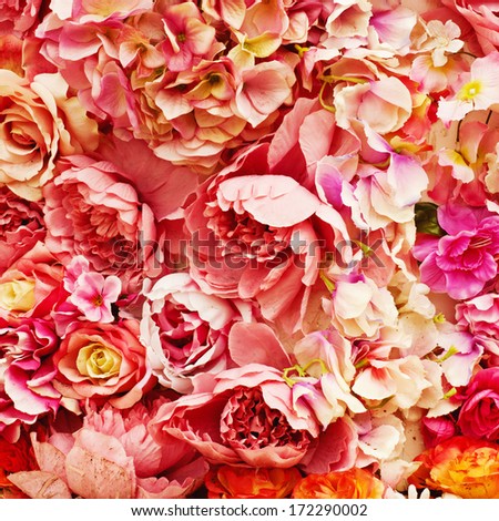 Background from red artificial wedding vivid roses