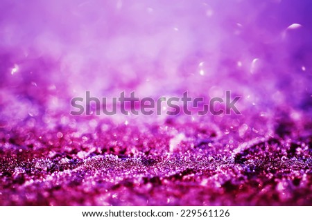 Winter iced glowing purple pattern with bokeh, holiday seasonal background