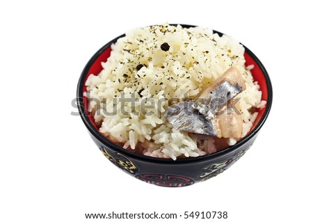 Boiled rice with herring in ceramic ware, shallow depth of field
