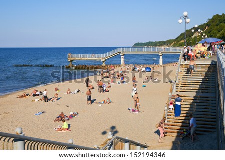 SVETLOGORSK, RUSSIA - AUGUST 29: Resort town on the Baltic sea coast, tourists relax at the popular sandy beach on August 29, 2013 in Svetlogorsk, Russia.