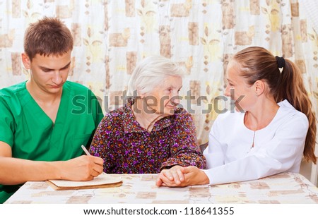 Elderly woman with the sweet young doctors