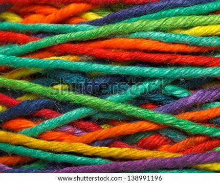 The multicolored yarn used for knitting clothes