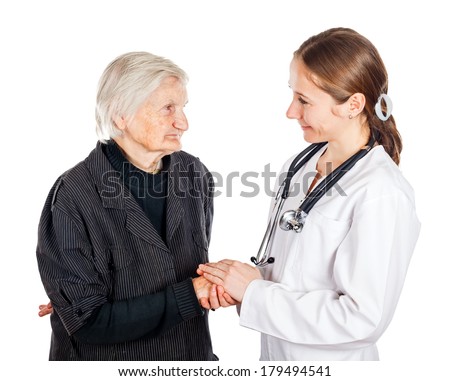Elderly woman with her helpful medical assistant