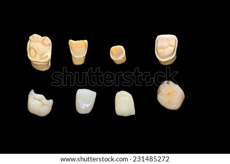 Dental ceramic crowns on isolated black background