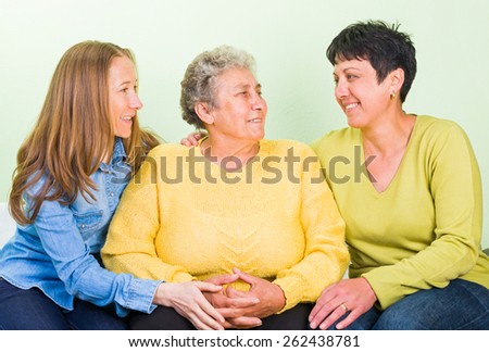 Photo of elderly woman with her daughters