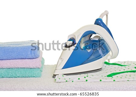 Electric iron and ironed clothes on board