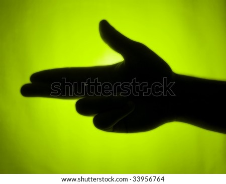 Lime back-lit hand signaling \'pistol\'