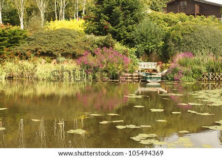 Small lake in a classic English country garden