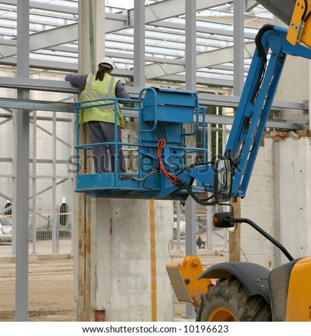 Construction site works in progress to a steel frame