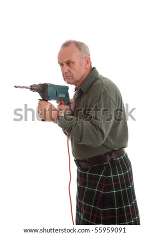 scotsman in kilt. stock photo : Mature Scotsman