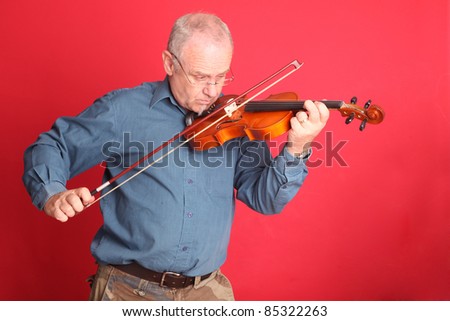 Practice time, a mature violinist practicing
