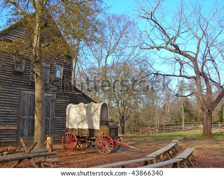 Rustic barn and covered wagon