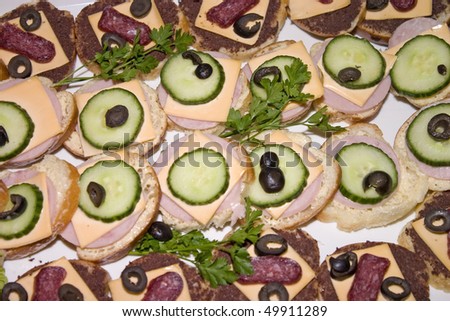 Catering buffet style - different light snack and sandwiches.