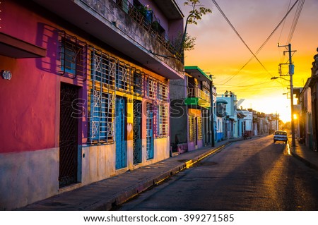 Camaguey, CUBA - The warm sunset light shines on the empty streets of the world heritage city centre in the Cuban city of Camaguey, an unique latin american city in the Caribbean -  January 2016