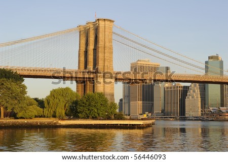 Base of the Brooklyn Bridge in New York City, photographed in the golden light of the rising sun