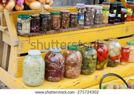 Home canning of fruits and vegetables. For sale at the village market, canning fruits and vegetables.