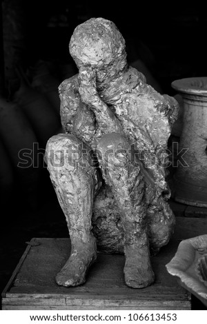 Black and white human victim body cast from Pompeii