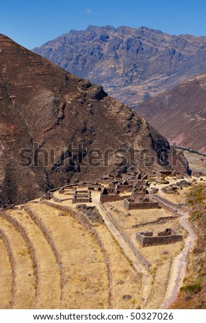 A view across ancient Inca terraces to ruins near the sacred valley in Peru, SOuth America