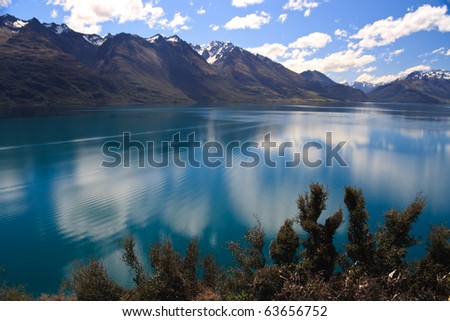 Scenic view of Lake Wakatipu with Southern Alps in background near Queenstown, South Island, New Zealand