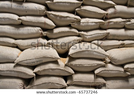 Forum Image: http://image.shutterstock.com/display_pic_with_logo/418831/418831,1290520527,4/stock-photo-pile-of-rice-sacks-in-grain-warehouse-vietnam-65737246.jpg