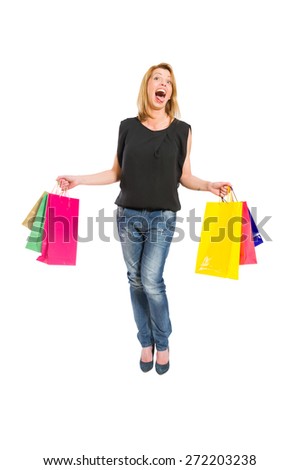 Shopping woman acting crazy isolated on white background