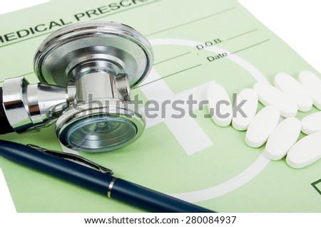Medical precscription concept with green official paper, pills and stethoscope