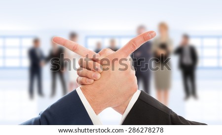 Business arms hand shake and finger point on business people background