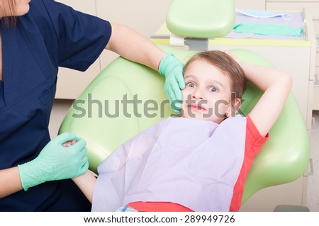 Special care for kid patient at dentist. No fear of dentist doctor concept