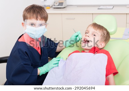 Kids playing in dental office. No fear of dentist concept