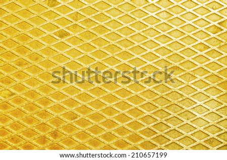 yellow gold metal texture background with diamond pattern