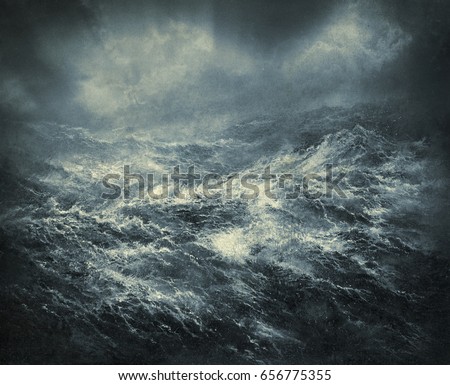 Stormy sea with big restless waves and ominous sky.
