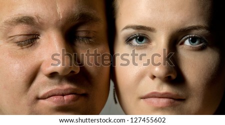 two face man and woman, together and very close up
